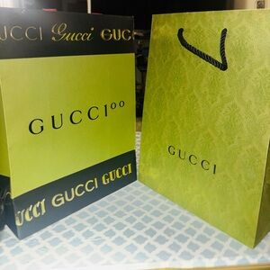Gucci 100th anniversary, shopping bag, and regular Gucci shopping bag